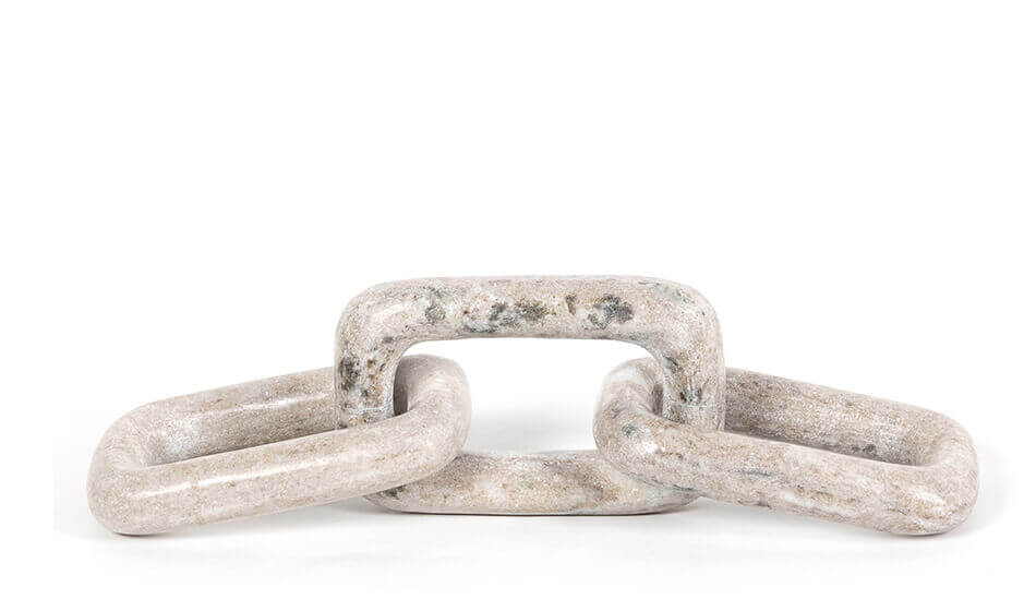 Marble Chain. A three link chain made of white marble with grey, black, and brown patterns.